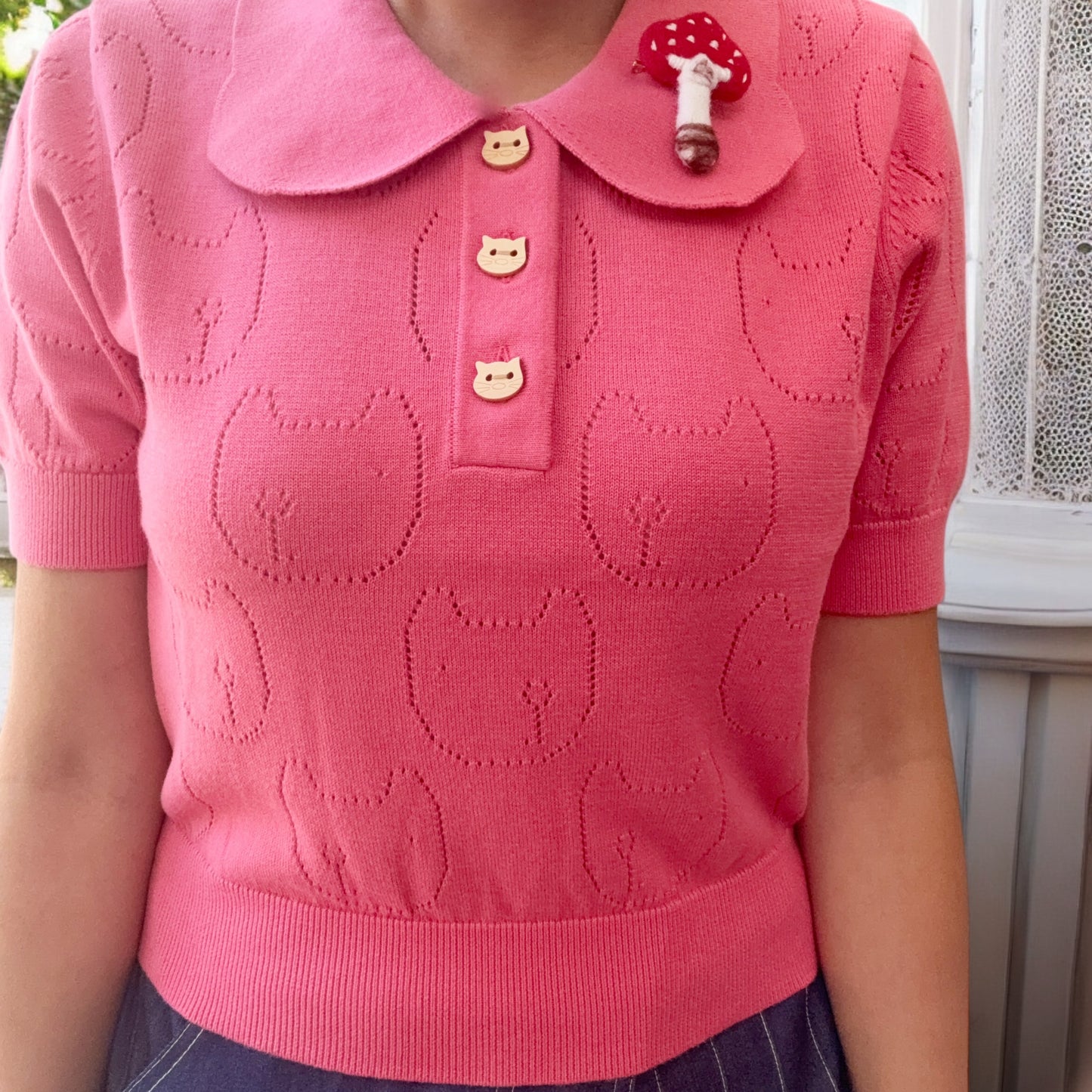Looking left and right cat pointelle sweater