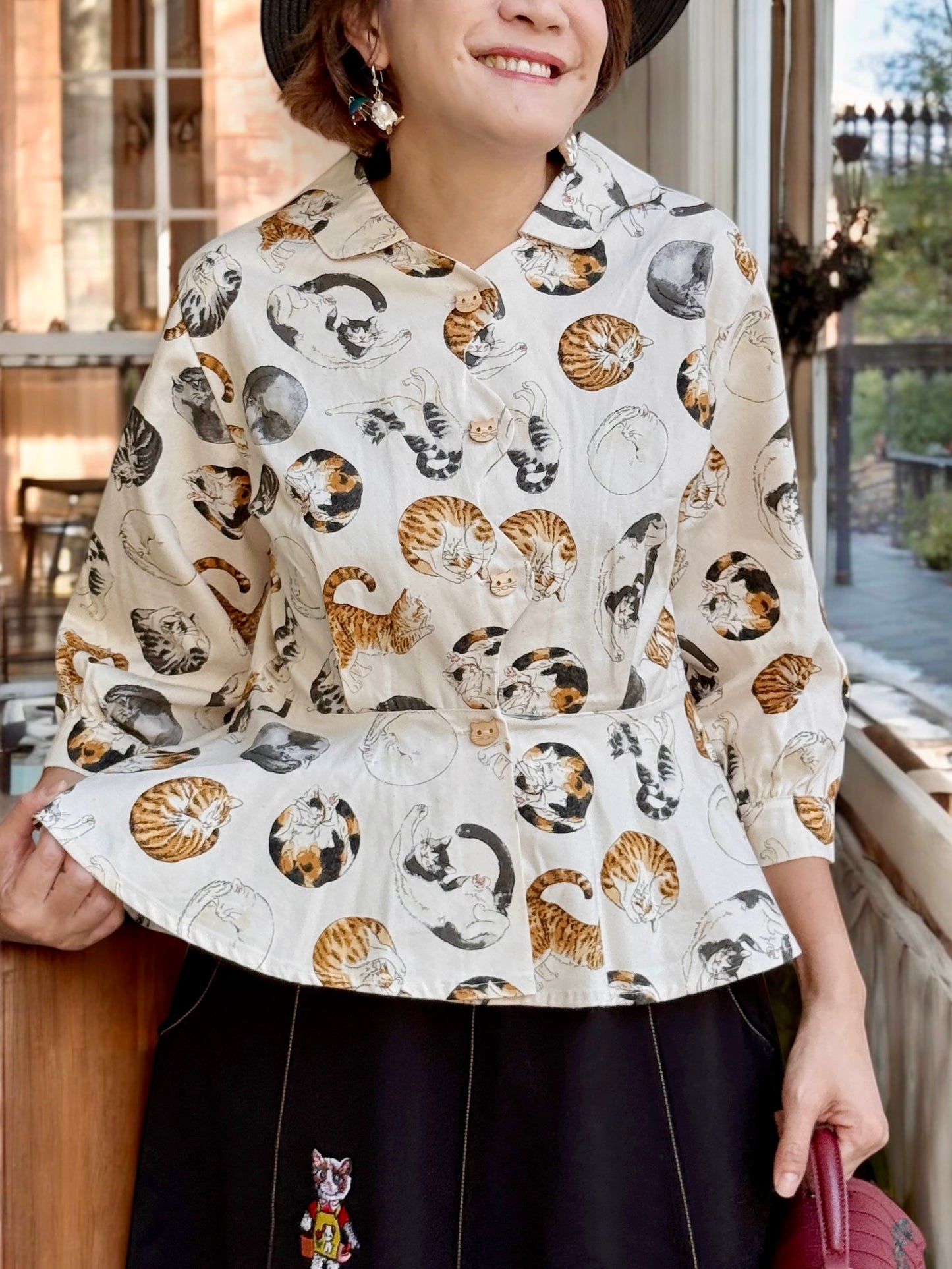 Cats in circle pattern shirt :