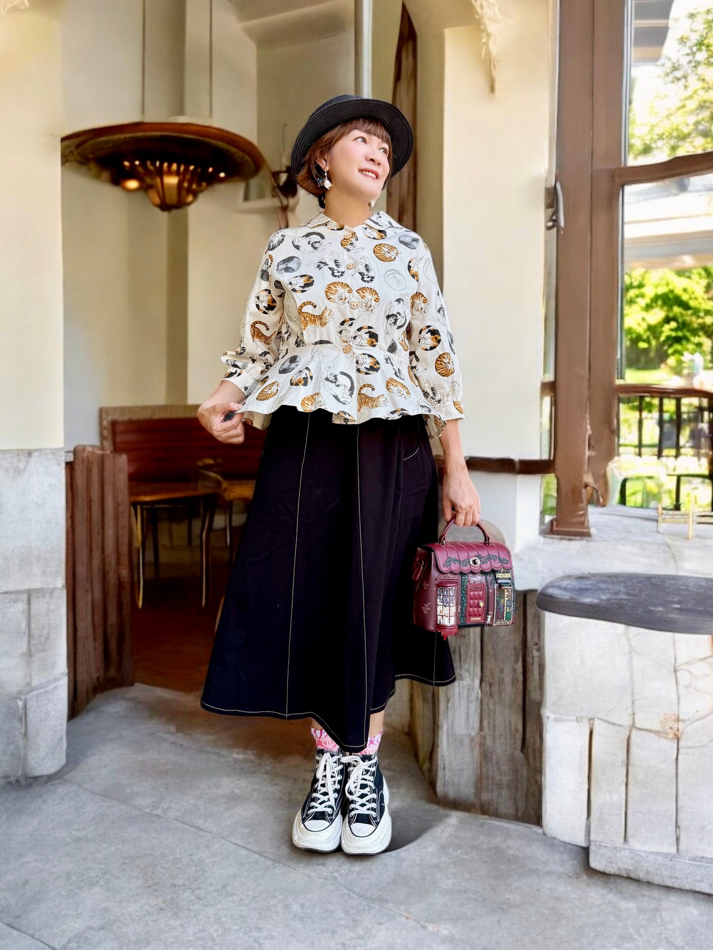 Cats in circle pattern shirt :