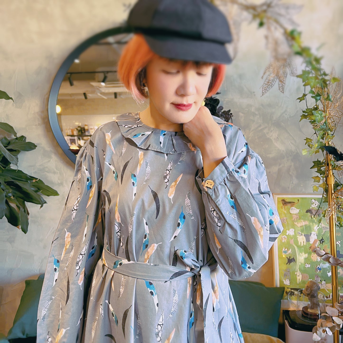 Feathers and pattern dress