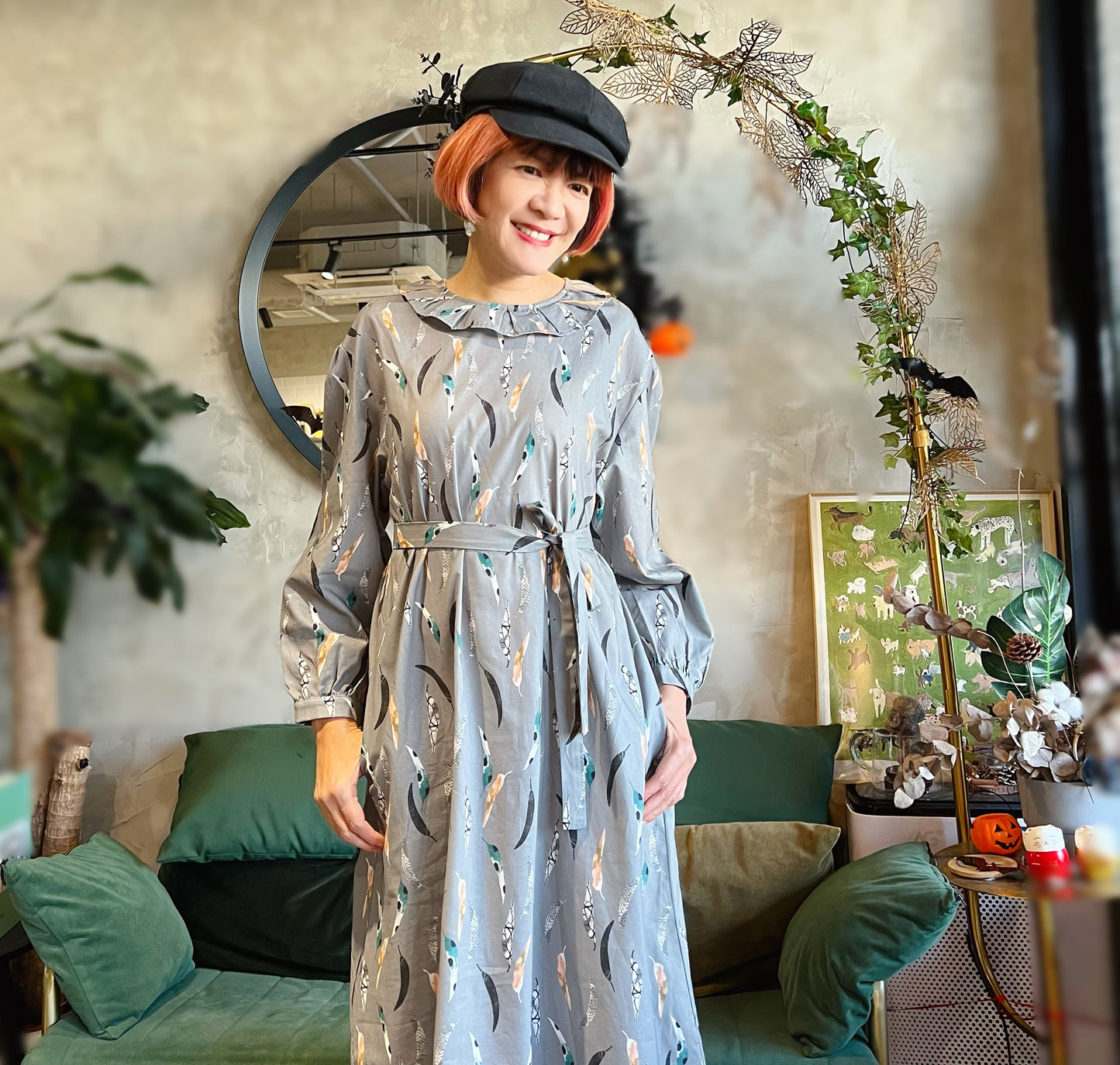 Feathers and pattern dress
