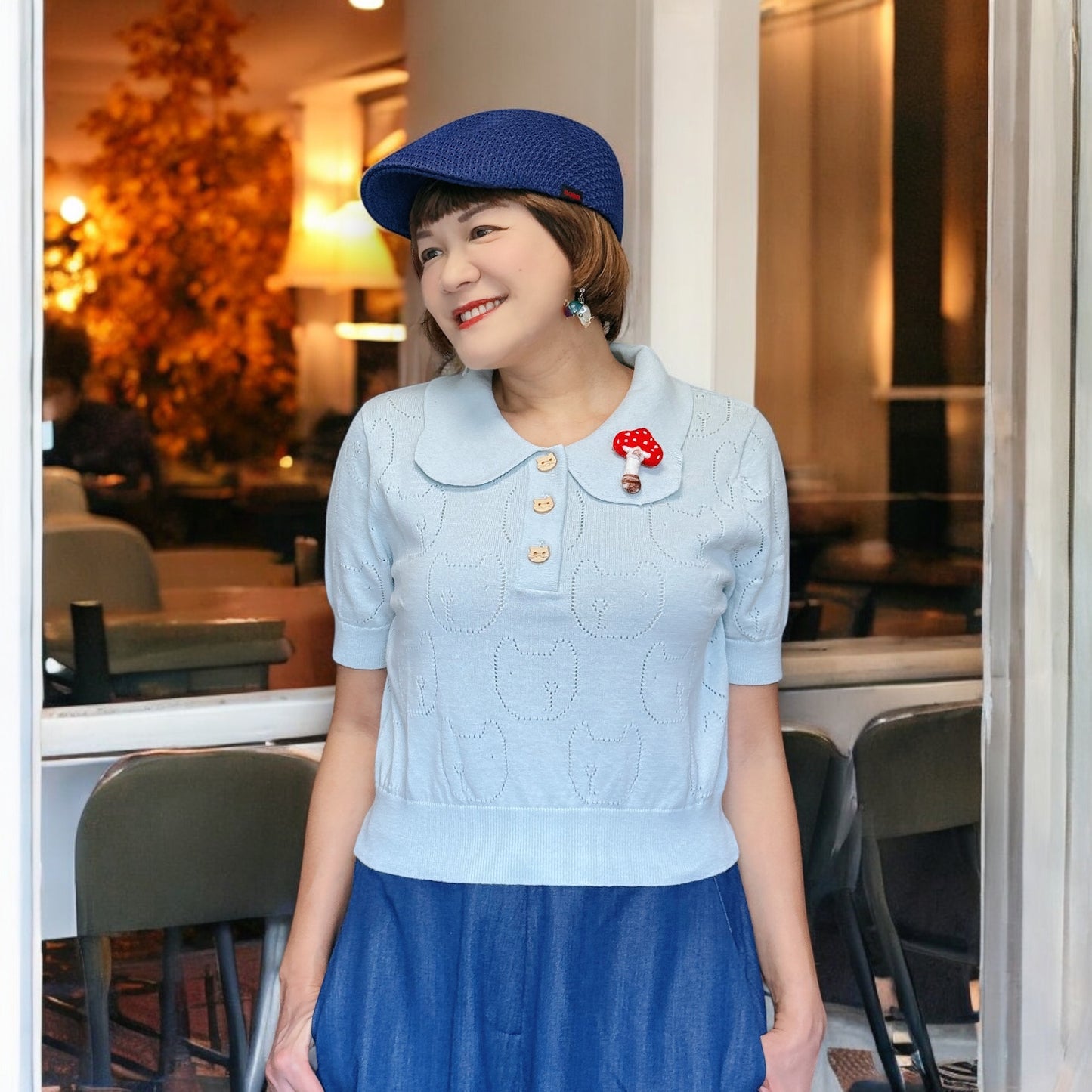 Looking left and right cat pointelle sweater
