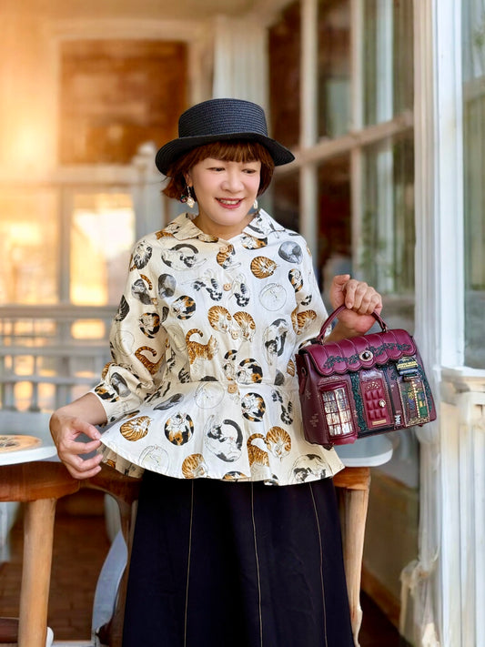 Cats in circle pattern shirt :