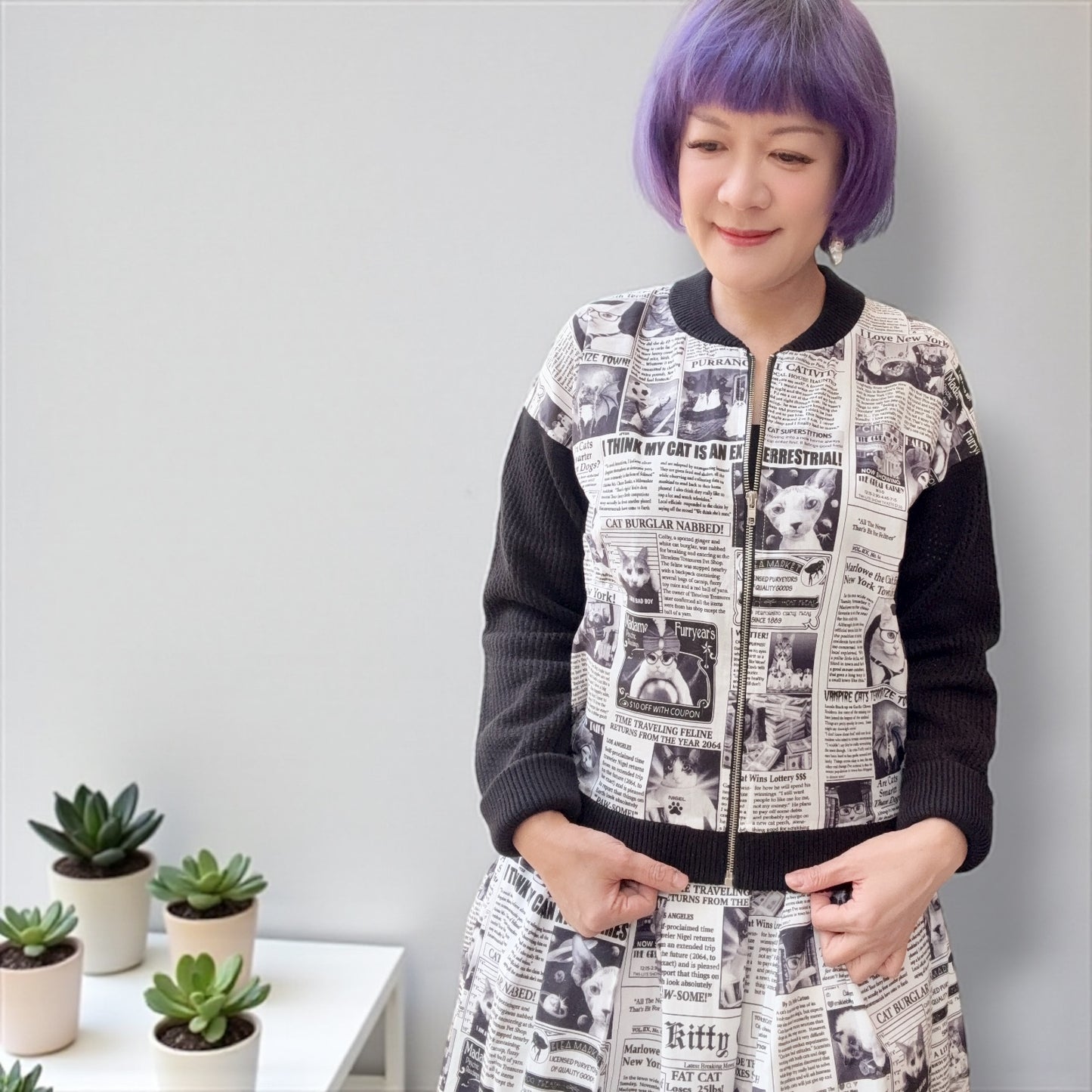 Cat newspaper and pointelle cardigan