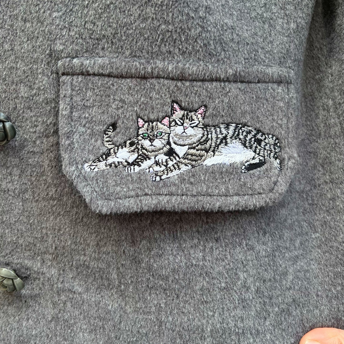 Felted wool cat with cat embroidery