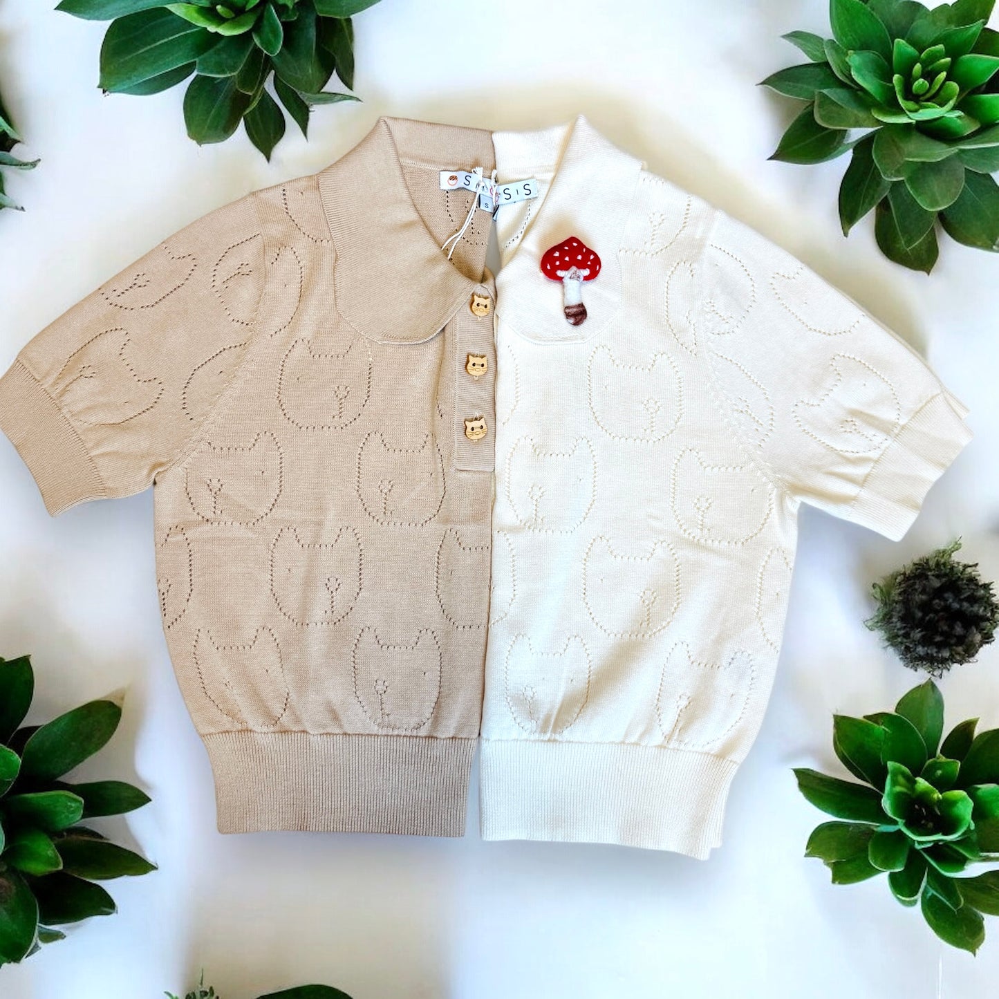 Looking left and right cat pointelle sweater