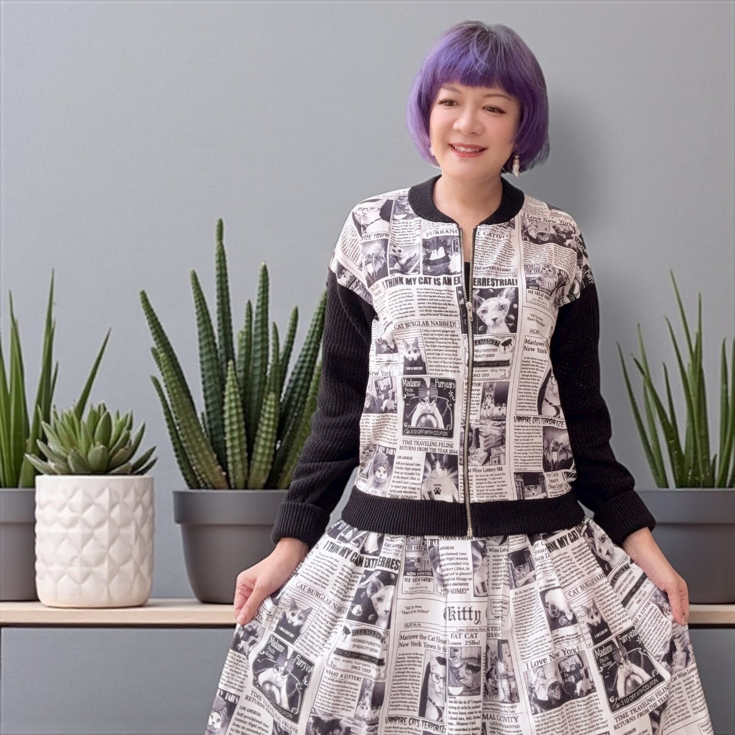 Cat newspaper and pointelle cardigan