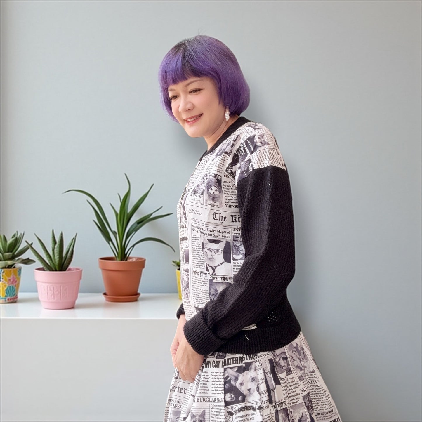 Cat newspaper and pointelle cardigan